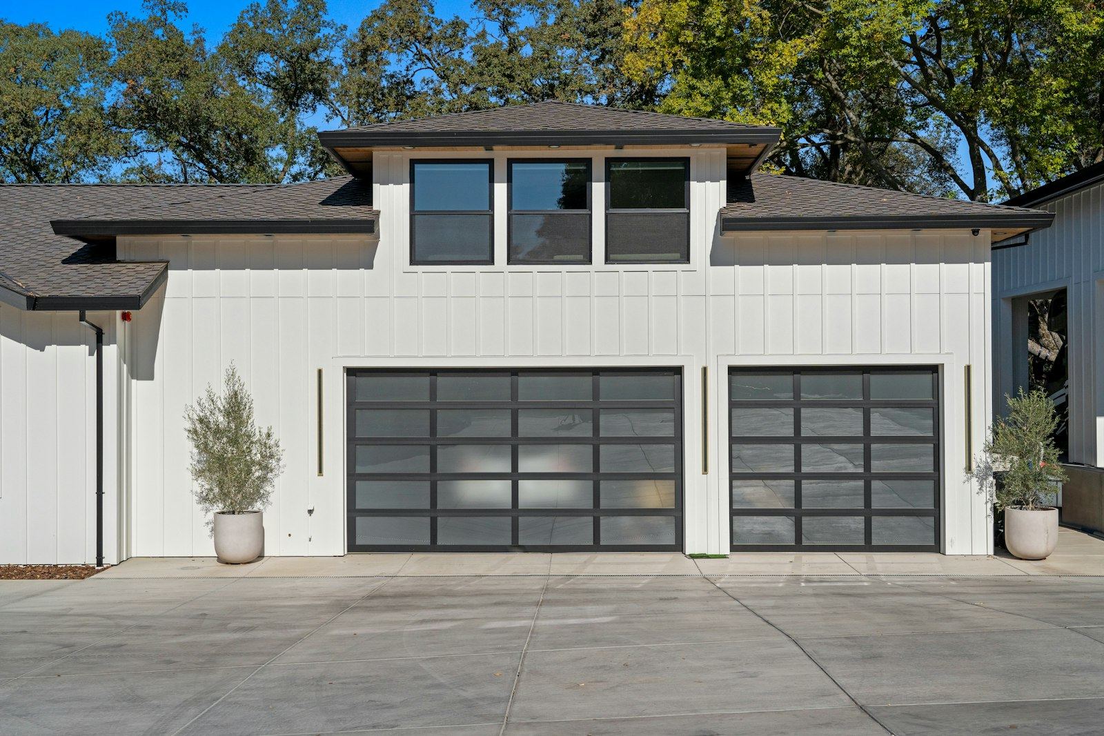 Modern full-view aluminum garage doors with clean horizontal panels installed by Doorfect